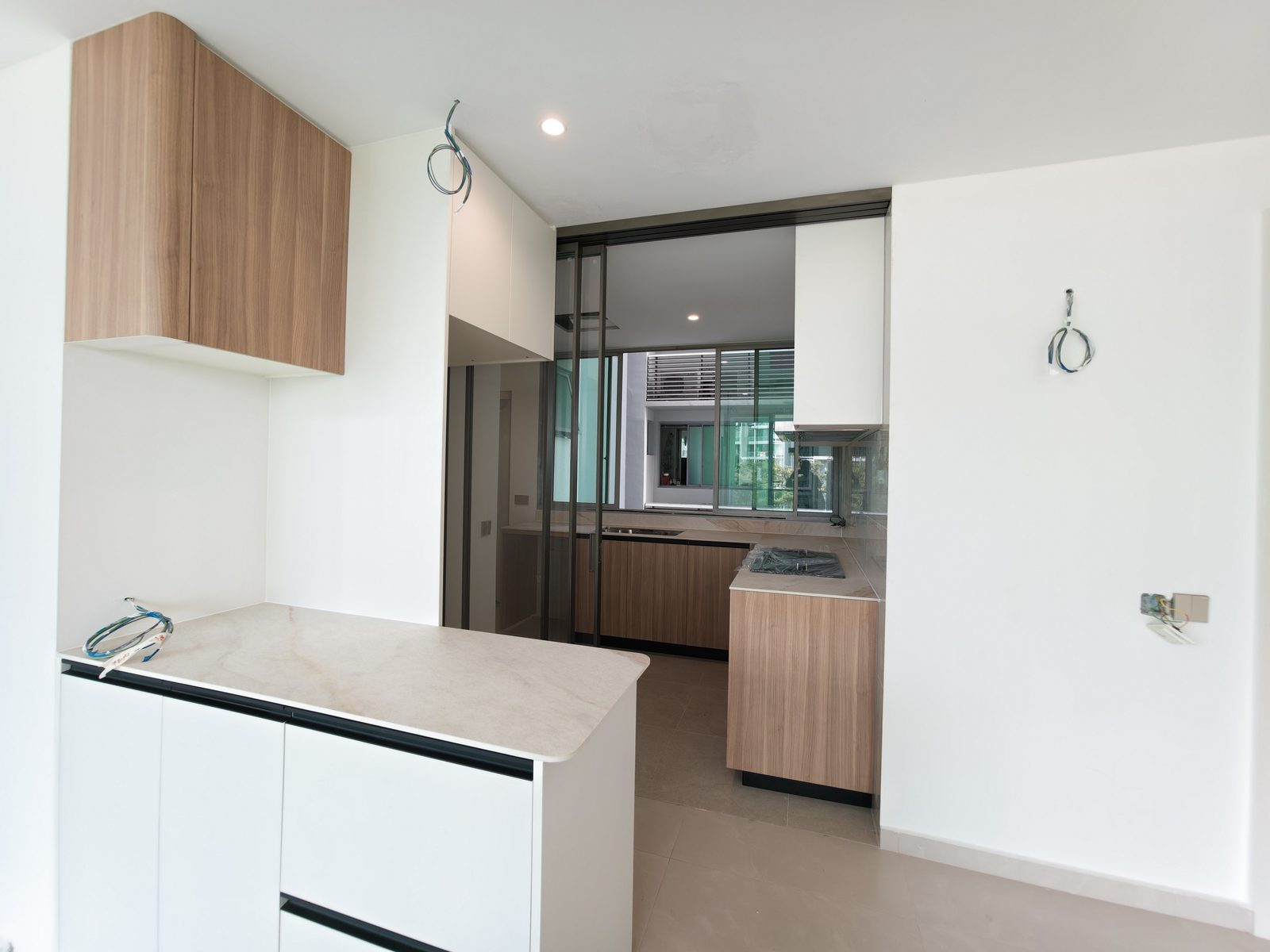 CASAWAVE completed custom kitchen with cabinetry and countertop in a renovated Singapore flat