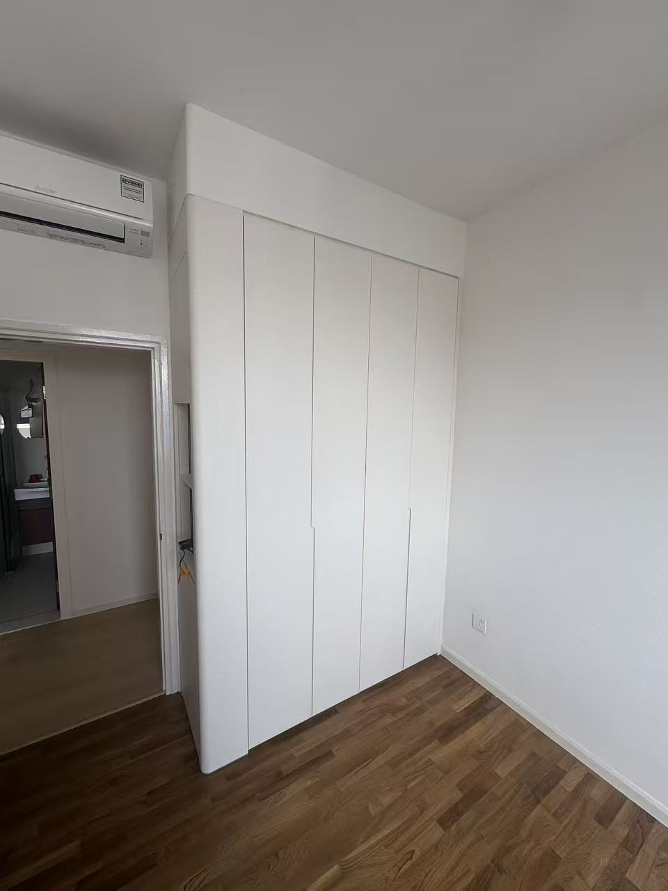 CASAWAVE custom wardrobe interior with organised storage layout in a Singapore home